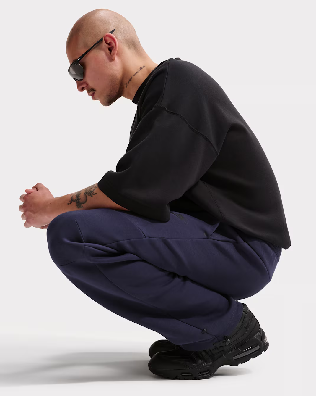 Nike Tech
Men's Open-Hem Fleece Trousers