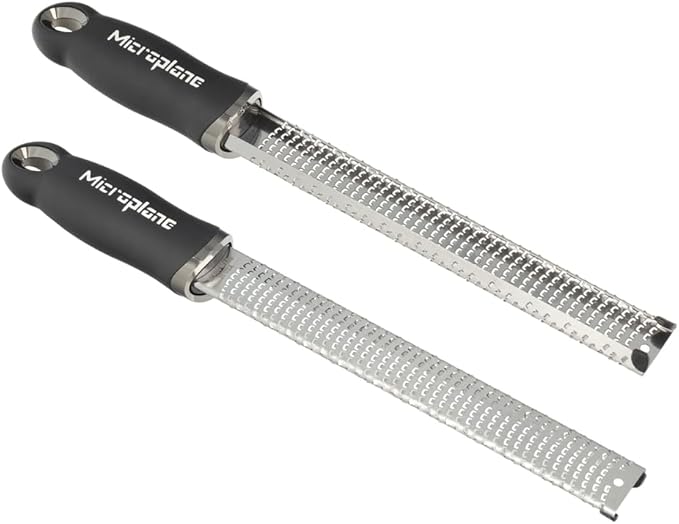 Microplane Zester Grater in Black for Citrus Fruits, Hard Cheese, Ginger, Chocolate and Nutmeg with Fine Stainless Steel Blade - Made in USA